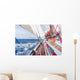 sail boat navigating on the waves Wall Mural