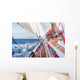 sail boat navigating on the waves Wall Mural
