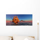 Ship Sailing Away from an Island at Sunset Wall Decal