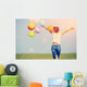 young asian woman on green grassland with colored balloons  Wall Decal