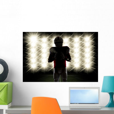 Football Player Wall Decal shown on a wall