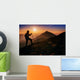 tourist in the mountains at sunset Wall Decal