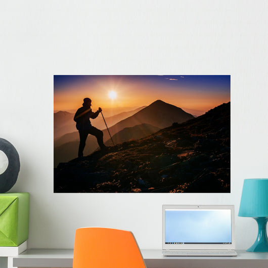 tourist in the mountains at sunset Wall Decal