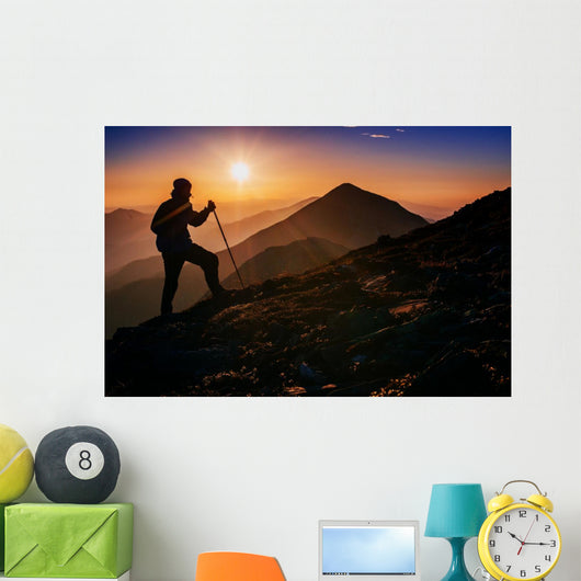tourist in the mountains at sunset Wall Decal