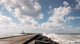 Wolkenlucht boven de pier van IJmuiden Wall Decal