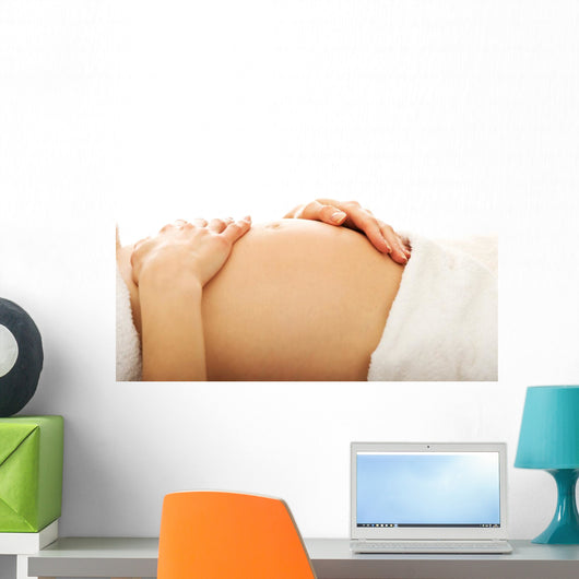 Pregnant woman massagin her belly Wall Decal
