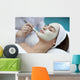A young woman with a face pack.  Wall Decal