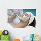 A young woman with a face pack.  Wall Decal