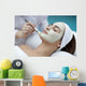 A young woman with a face pack.  Wall Decal