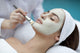 A young woman with a face pack.  Wall Decal