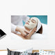 A young woman with a face pack.  Wall Decal