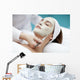 A young woman with a face pack.  Wall Decal