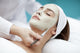 A young woman with a face pack.  Wall Decal