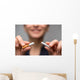 Addiction. Closeup of young attractive woman breaking cigarettes Wall Decal