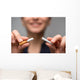 Addiction. Closeup of young attractive woman breaking cigarettes Wall Decal