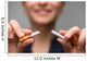 Addiction. Closeup of young attractive woman breaking cigarettes Wall Decal
