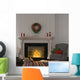 Vintage gray armchair near the fireplace with Christmas decor Wall Decal