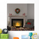 Vintage gray armchair near the fireplace with Christmas decor Wall Decal