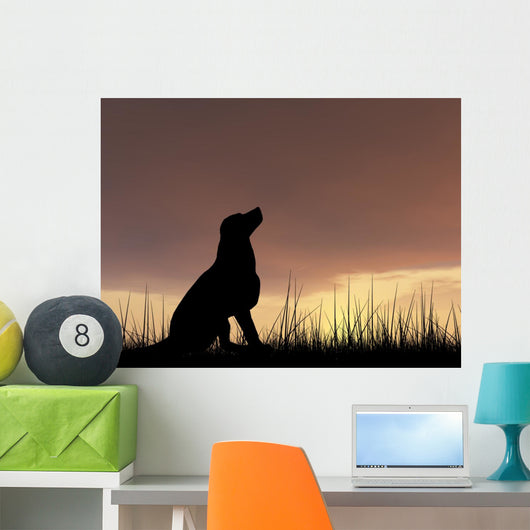 Dog silhouette in grass at sunset Wall Decal