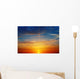 the sun rays illuminate the sky above the horizon Wall Decal