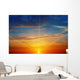 the sun rays illuminate the sky above the horizon Wall Decal