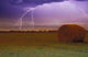 Lightning Over A Field Wall Mural