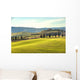 Artistic Tuscan landscape with cypresses, wavy fields and house Wall Decal