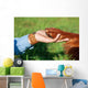 Human Hand Holding Dog's Wall Decal
