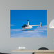 Helicopter flying in the blue sky Wall Decal