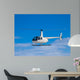Helicopter flying in the blue sky Wall Decal