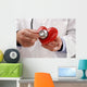 Doctor holding heart Wall Decal