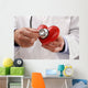 Doctor holding heart Wall Decal