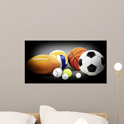 Sports Balls Wall Decal shown on a wall