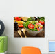 Fruit and vegetable salad in a bowl on wooden table Wall Decal
