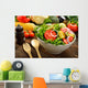 Fruit and vegetable salad in a bowl on wooden table Wall Decal