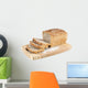 Cut wholemeal bread on a chopping board Wall Decal
