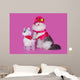 cat in a pink dress and hat with a baby carriage and a toy on a Wall Decal
