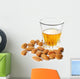 Dessert liqueur Amaretto with almond nuts, isolated on white Wall Decal