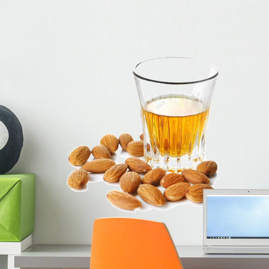Dessert liqueur Amaretto with almond nuts, isolated on white Wall Decal