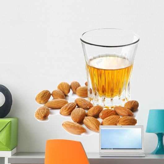 Dessert liqueur Amaretto with almond nuts, isolated on white Wall Decal