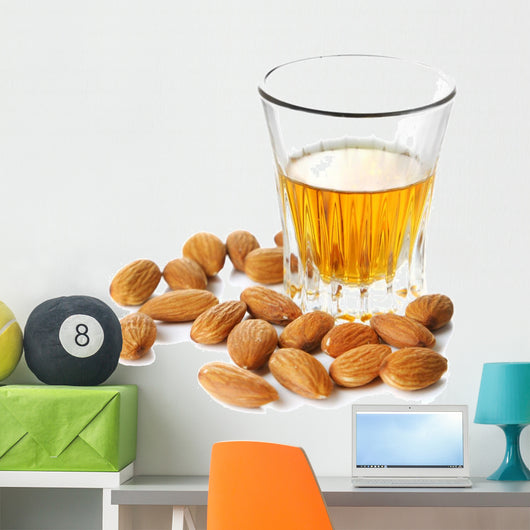 Dessert liqueur Amaretto with almond nuts, isolated on white Wall Decal
