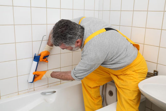 Worker Plumber Caulking Bath Wall Decal