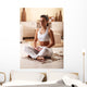 Young woman meditate in her living room. Wall Decal