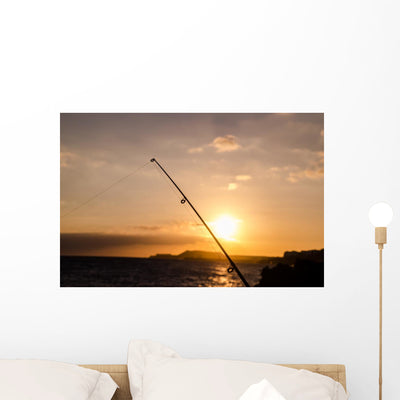 Fisherman Fishing Rod Silhouette Wall Decal shown on a wall