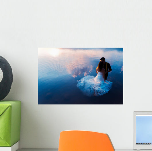 bride and groom on the water in the lake, trash the dress Wall Decal