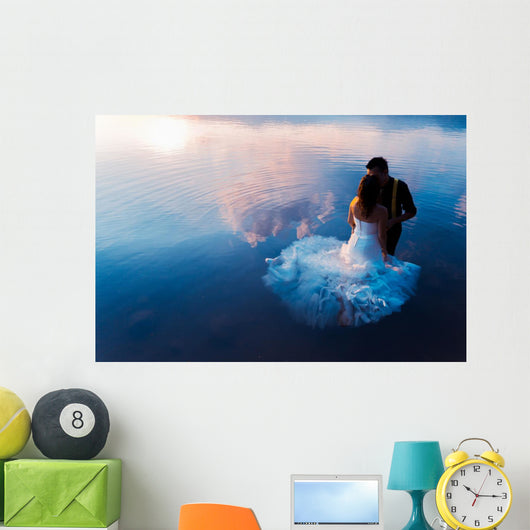 bride and groom on the water in the lake, trash the dress Wall Decal