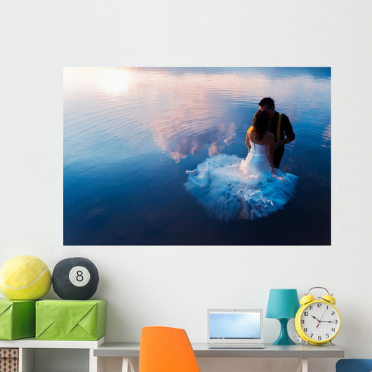 bride and groom on the water in the lake, trash the dress Wall Decal