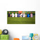 Football soccer match for children. Kids breiefing with trainer Wall Decal