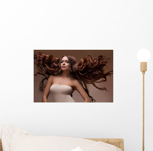 Portrait of Beautiful Woman with Long flying Hair. Wall Decal