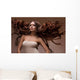 Portrait of Beautiful Woman with Long flying Hair. Wall Decal